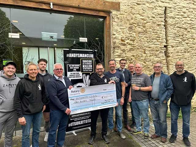 Group of men take on Pen y Fan challenge for mental health support club